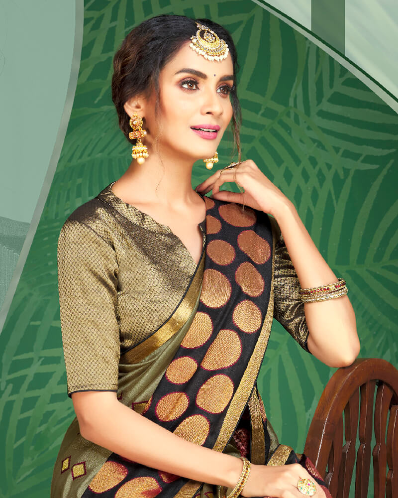 Vishal Prints Pastel Olive And Black Brasso Saree With Foil Print And Jari Border