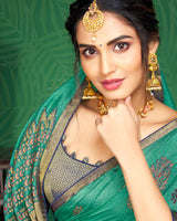 Vishal Prints Aqua Green And Navy Blue Brasso Saree With Foil Print And Jari Border