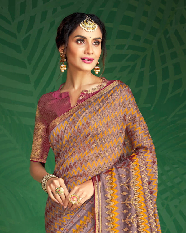 Vishal Prints Mauve And Golden Yellow Brasso Saree With Foil Print And Jari Border