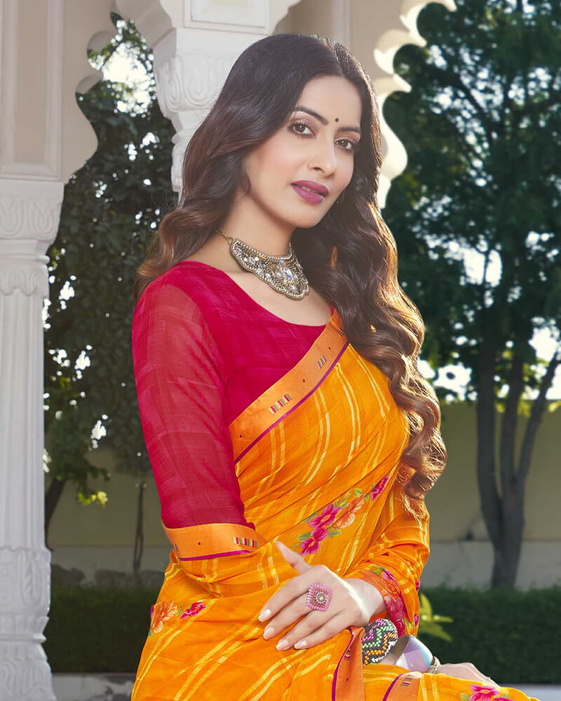 Vishal Prints Yellowish Orange Printed Georgette Saree With Border