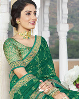 Vishal Prints Dark Sea Green Brasso Saree With Foil Print And Zari Border