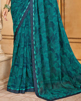 Vishal Prints Dark Teal Blue Printed Georgette Saree With Fancy Border