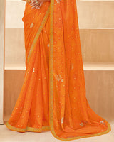 Vishal Prints Orange Printed Chiffon Saree With Foil Print And Zari Border