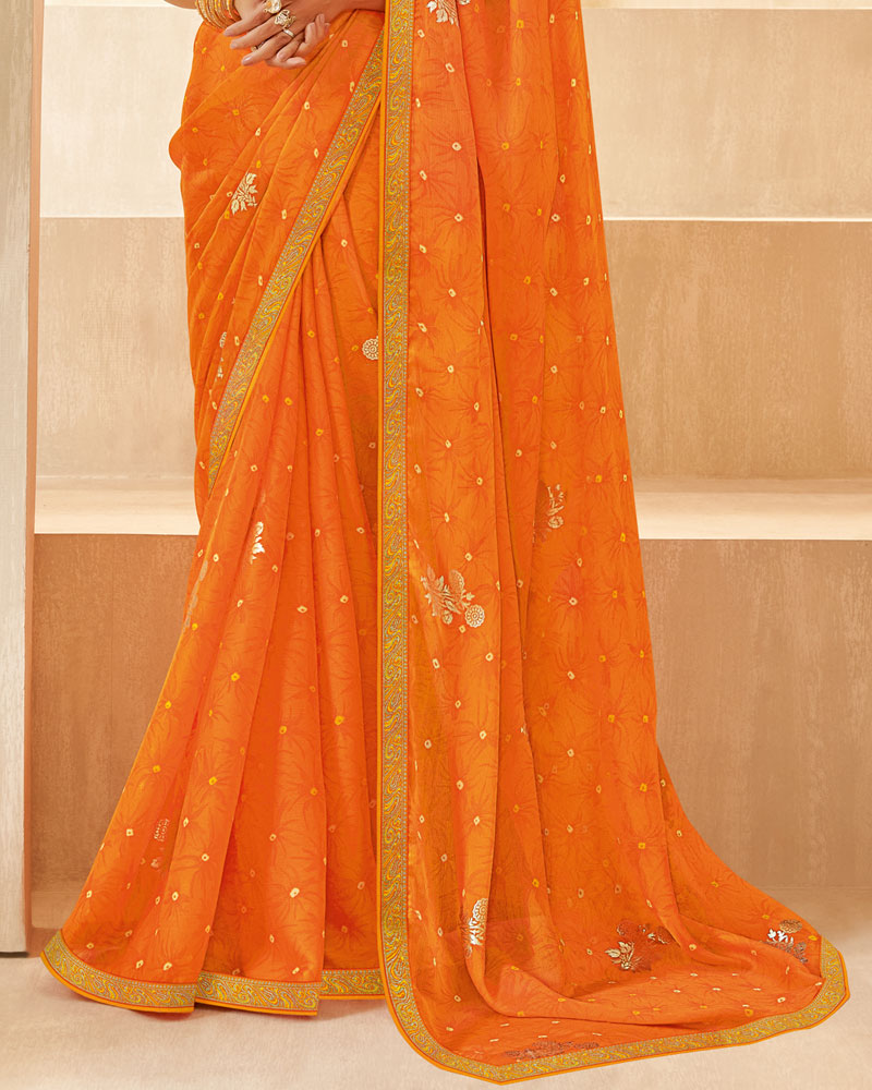 Vishal Prints Orange Printed Chiffon Saree With Foil Print And Zari Border