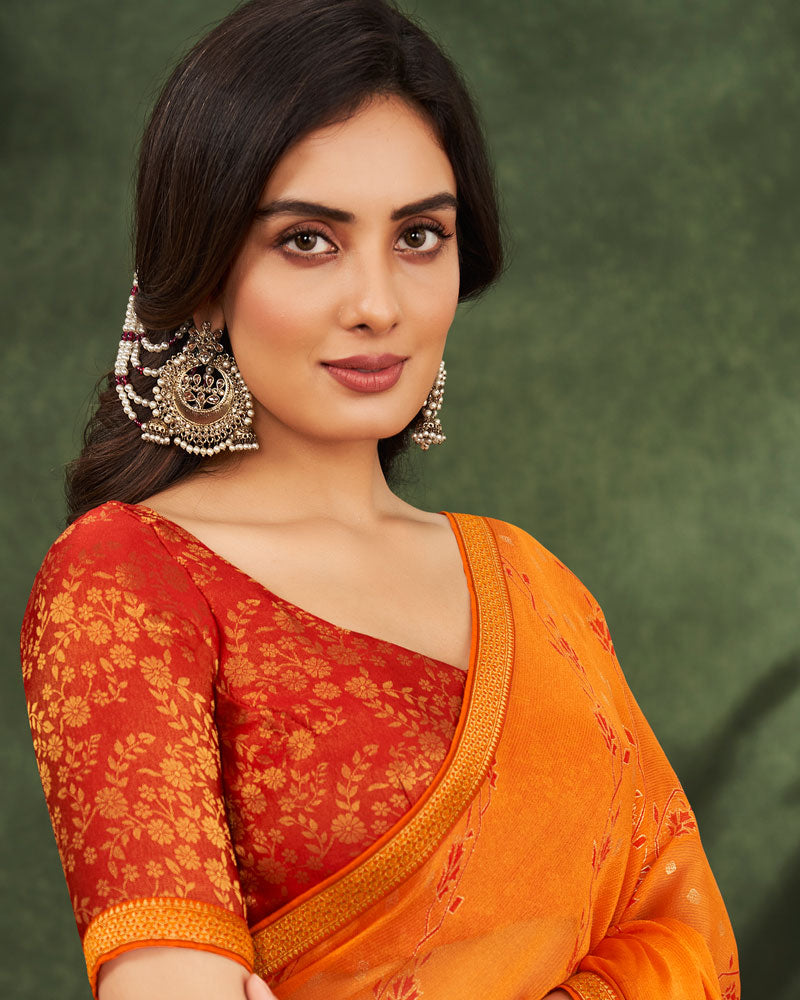 Vishal Prints Orange Printed Chiffon Saree With Foil Print And Zari Border