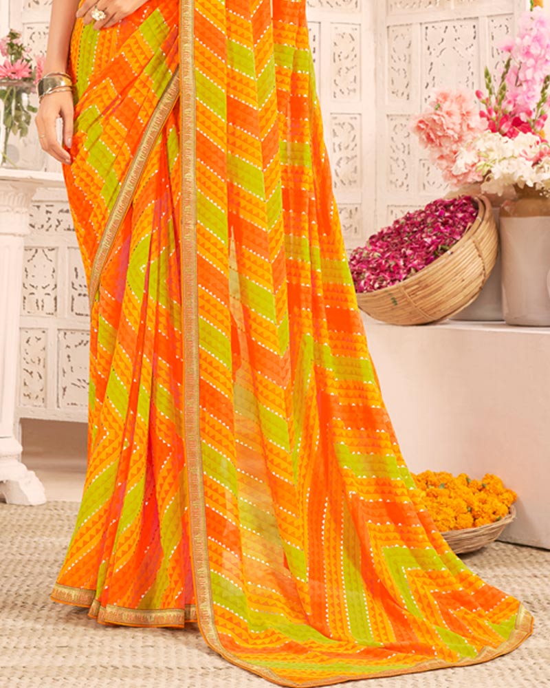 Vishal Prints Dark Orange Printed Weightless Georgette Saree With Foil Print And Zari Border