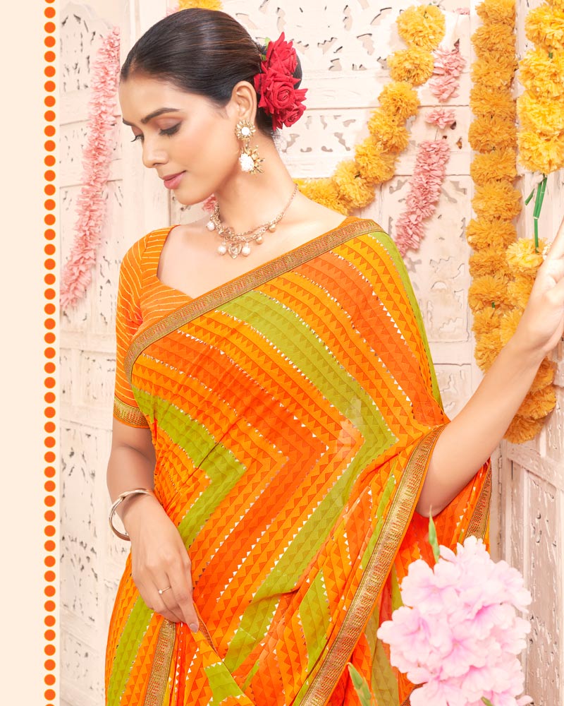 Vishal Prints Dark Orange Printed Weightless Georgette Saree With Foil Print And Zari Border