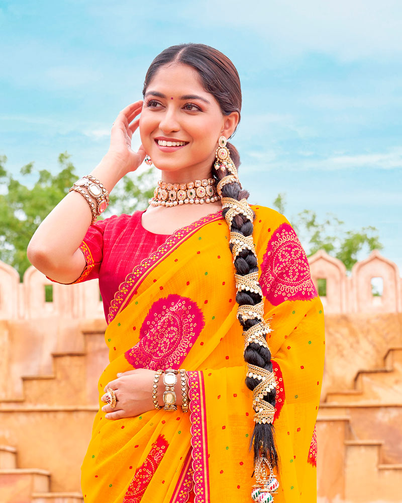 Vishal Prints Dark Yellow And Raspberry Pink Fancy Chiffon Traditional Print Saree With Foil Print And Cut Work Border