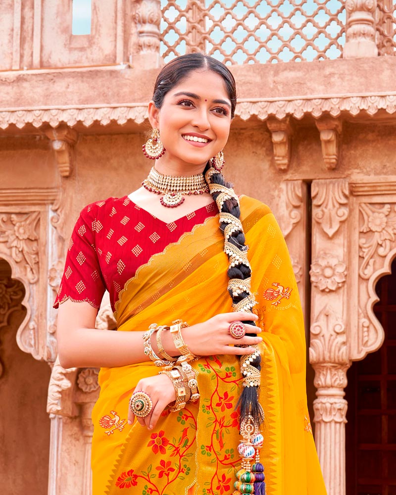 Vishal Prints Golden Yellow And Venetian Red Fancy Chiffon Traditional Print Saree With Foil Print And Weaved Viscose Cut Work Border