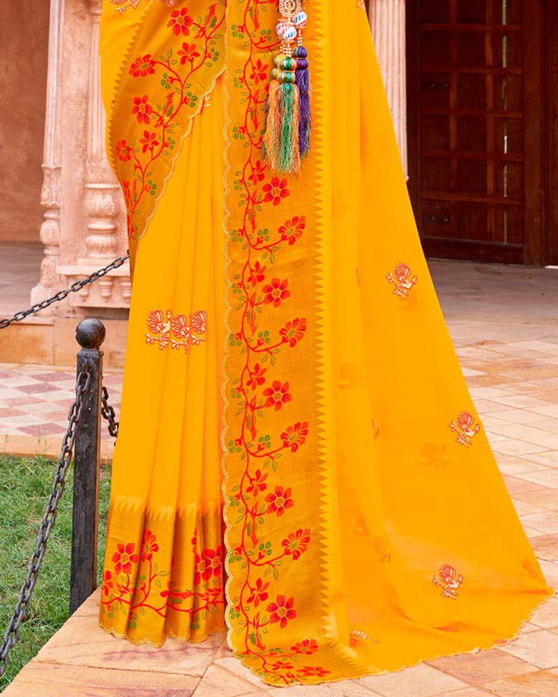 Vishal Prints Golden Yellow And Venetian Red Fancy Chiffon Traditional Print Saree With Foil Print And Weaved Viscose Cut Work Border