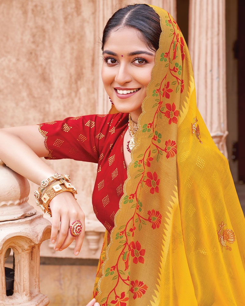 Vishal Prints Golden Yellow And Venetian Red Fancy Chiffon Traditional Print Saree With Foil Print And Weaved Viscose Cut Work Border