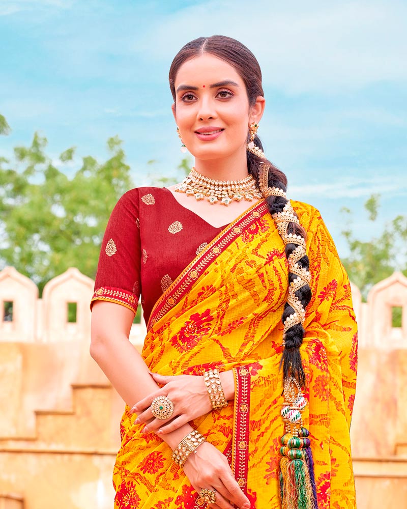 Vishal Prints Dark Yellow And Lava Red Fancy Chiffon Traditional Print Saree With Foil Print And Fancy Border