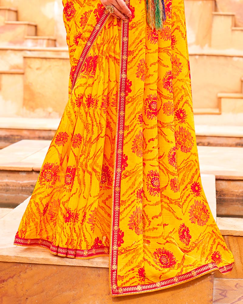 Vishal Prints Dark Yellow And Lava Red Fancy Chiffon Traditional Print Saree With Foil Print And Fancy Border