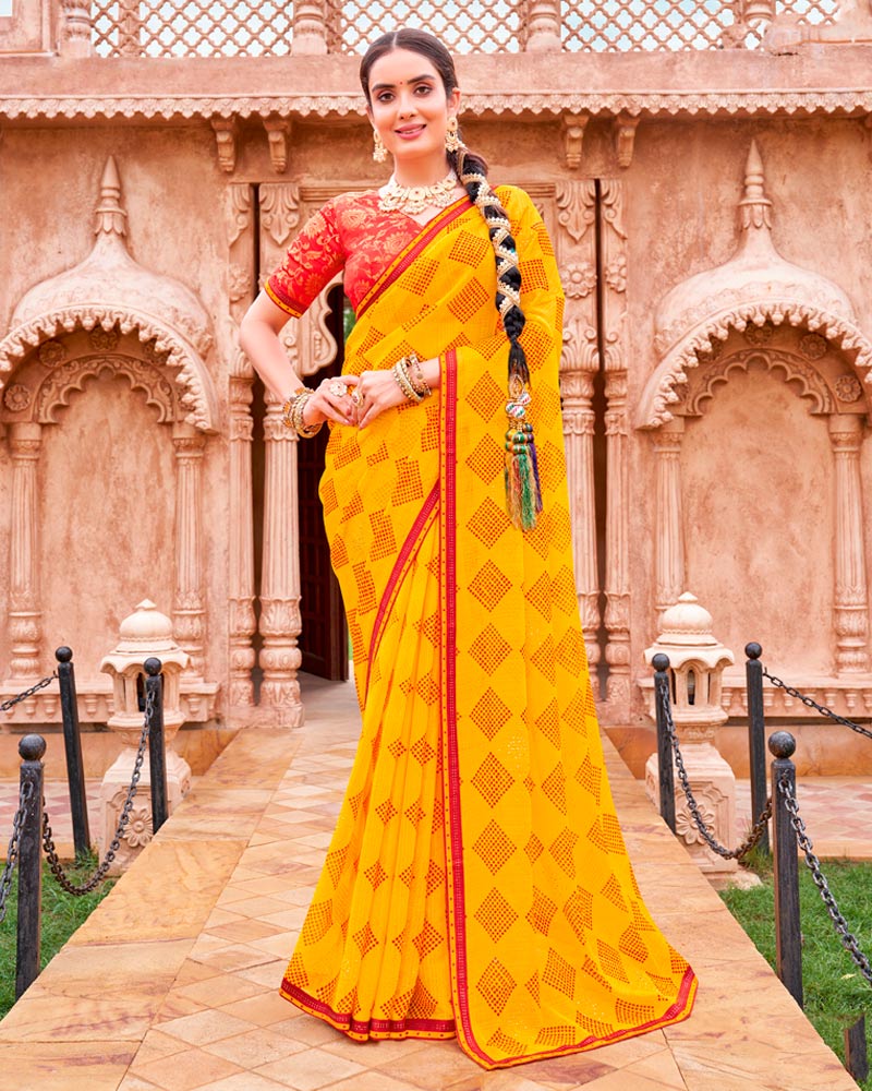 Vishal Prints Golden Yellow And Chili Red Fancy Chiffon Traditional Print Saree With Foil Print And Fancy Border