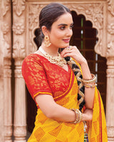 Vishal Prints Golden Yellow And Chili Red Fancy Chiffon Traditional Print Saree With Foil Print And Fancy Border