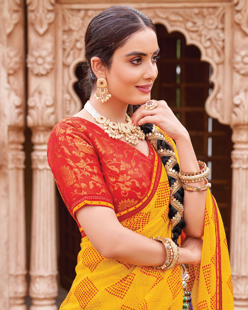 Vishal Prints Golden Yellow And Chili Red Fancy Chiffon Traditional Print Saree With Foil Print And Fancy Border