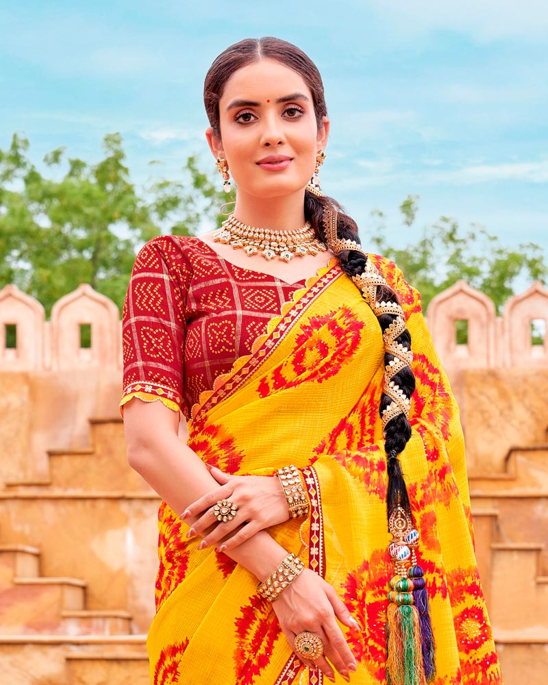 Vishal Prints Dark Yellow And Milano Red Fancy Chiffon Traditional Print Saree With Foil Print And Cut Work Border