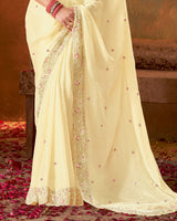 Vishal Prints Light Pastel Yellow Fancy Satin 4 Sequence Embroidery Work Saree With Moti-Cut Dana Border