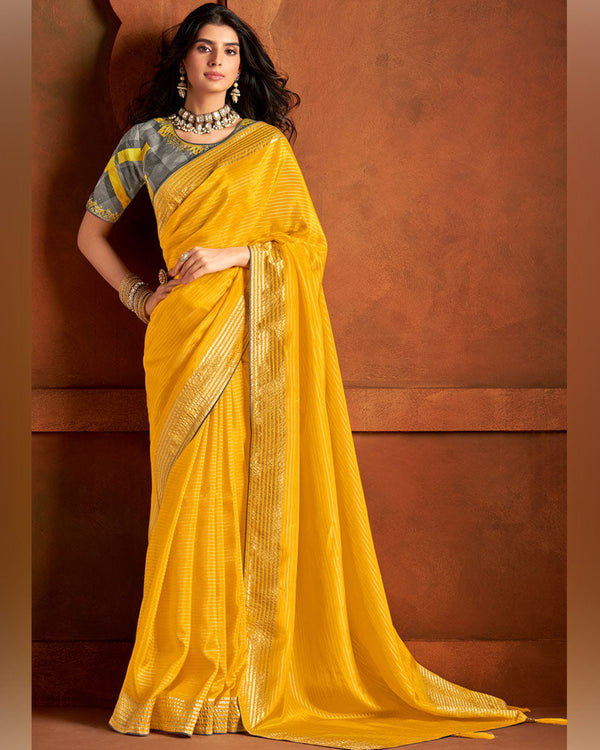 Vishal Prints Dark Yellow Pure Viscose Zari Lining Saree With Raw Silk Piping And Tassel