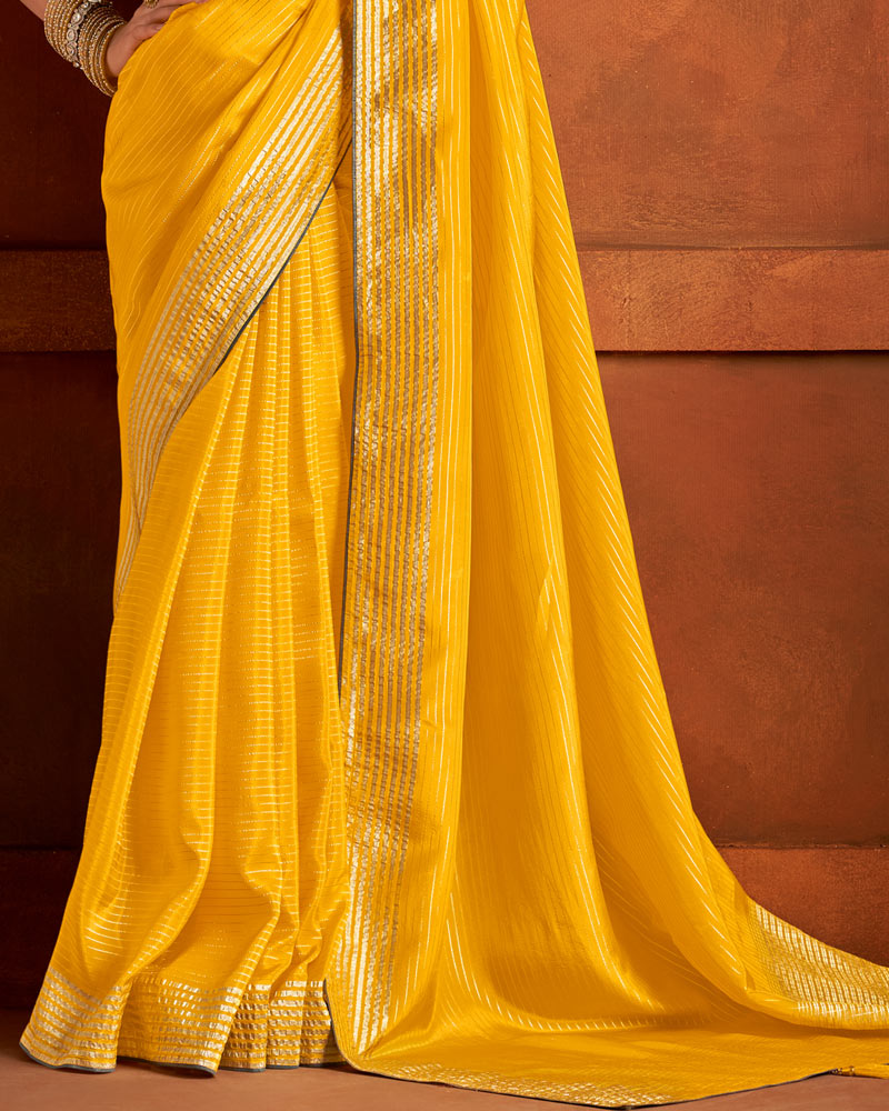 Vishal Prints Dark Yellow Pure Viscose Zari Lining Saree With Raw Silk Piping And Tassel