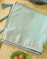 Pastel Sea Green Fancy Organza Saree With Viscose Zari Lining And Tassel