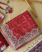 Brick Red Designer Raw Silk Traditional Print Saree With Foil Print And Gota Patti Embroidery Work Border