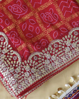 Brick Red Designer Raw Silk Traditional Print Saree With Foil Print And Gota Patti Embroidery Work Border
