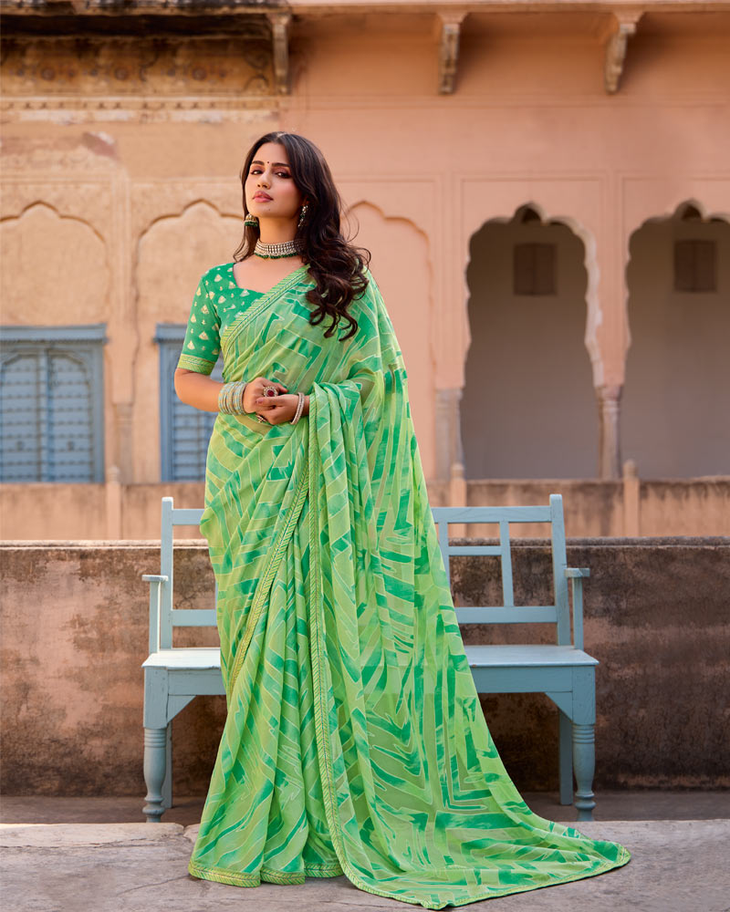 Vishal Prints Pastel Green Printed Brasso Saree With Fancy Border