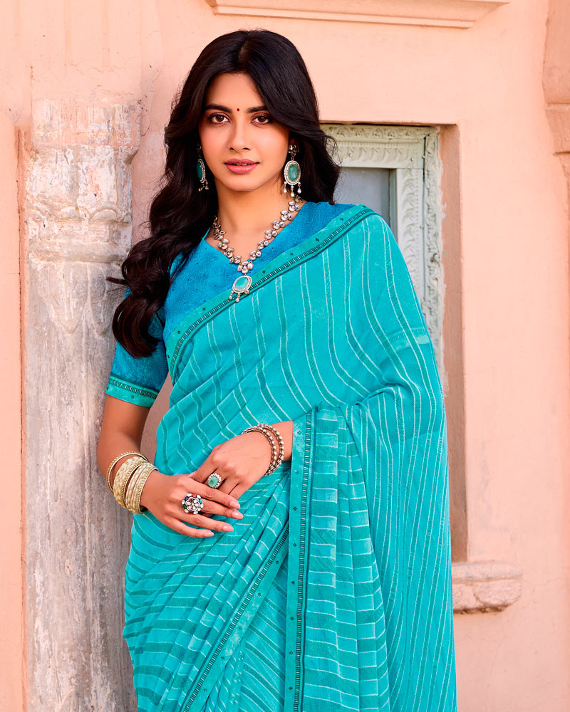 Vishal Prints Fountain Blue Printed Brasso Saree With Fancy Border