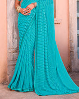 Vishal Prints Fountain Blue Printed Brasso Saree With Fancy Border