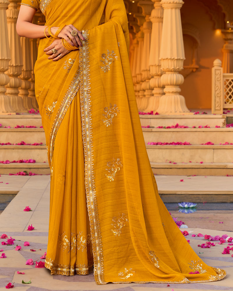 Pale Mustard Designer Fancy Chiffon Saree With Zari-Embroidery-Diamond Work And Cut Work Border