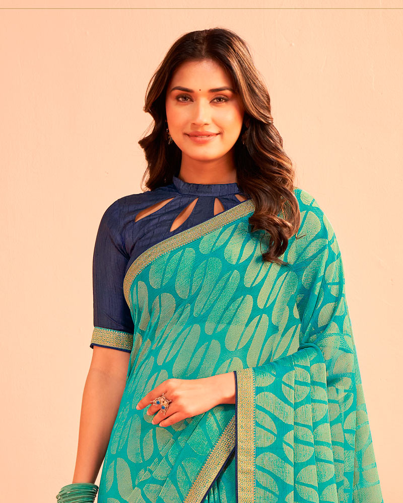 Vishal Prints Teal Green Printed Chiffon-Brasso Saree With Zari Border