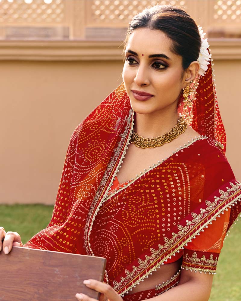 Vishal Prints Kumkum Red Traditional Print Georgette Saree With Fancy Gota Patti Border