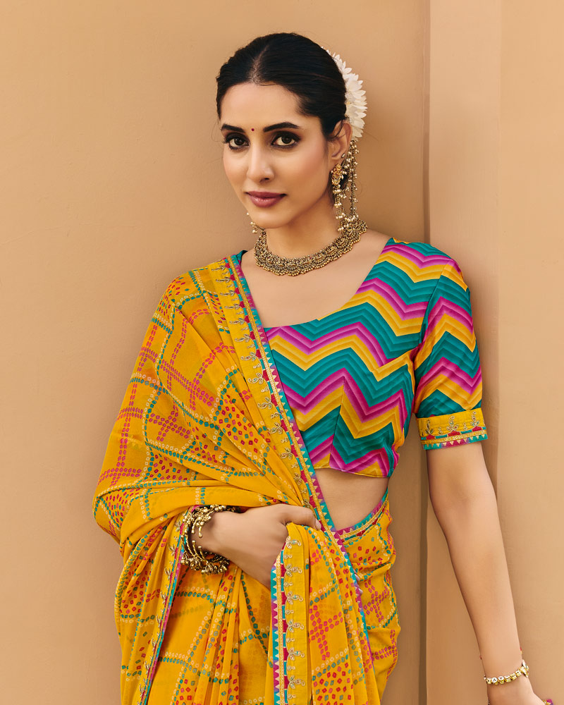 Vishal Prints Kesariya Peela Traditional Print Georgette Saree With Fancy Gota Patti Border