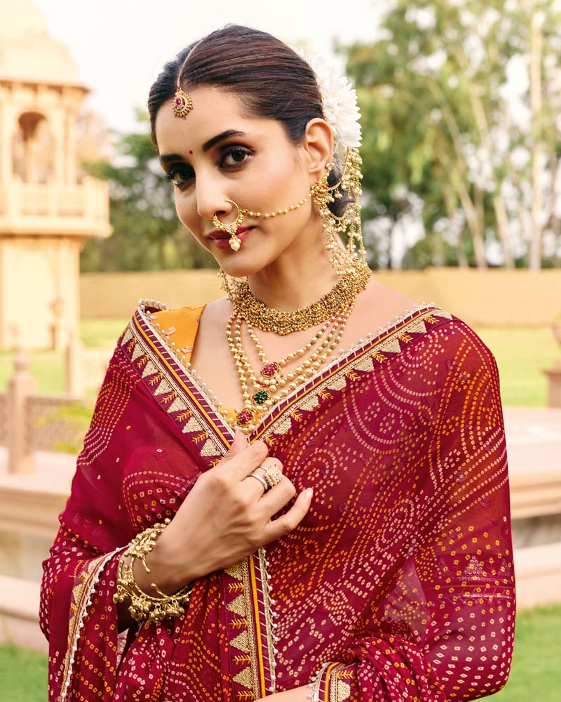 Vishal Prints Maroon Traditional Print Georgette Saree With Fancy Gota Patti Border