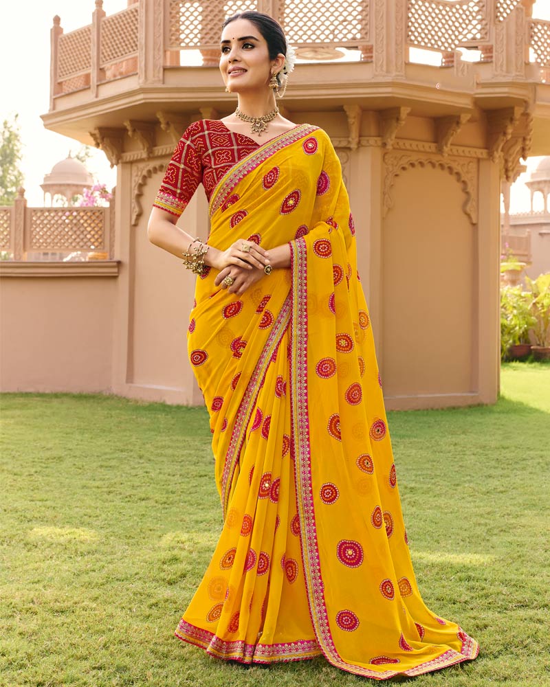 Vishal Prints Haldi Peela Traditional Print Georgette Saree With Fancy Gota Patti Border