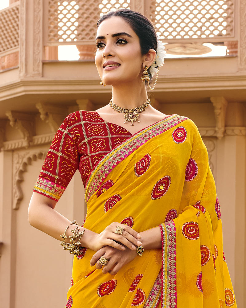 Vishal Prints Haldi Peela Traditional Print Georgette Saree With Fancy Gota Patti Border