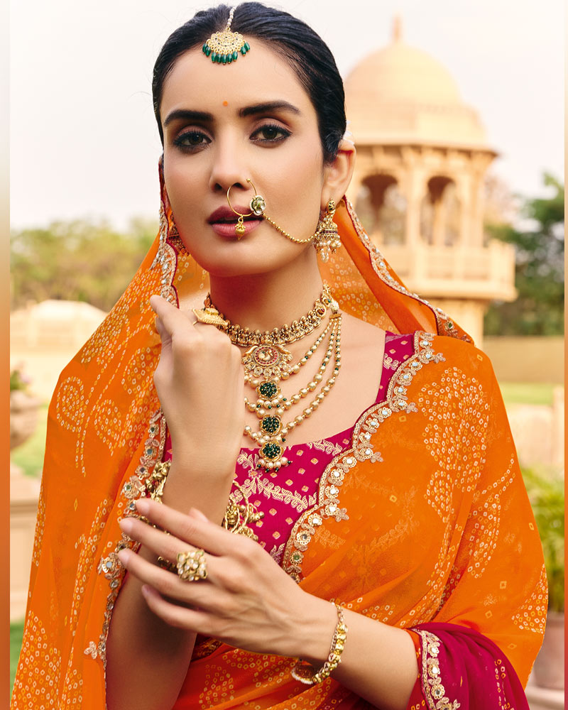 Vishal Prints Orange Maroon Traditional Print Georgette Saree With Fancy Cut Work Embroidery Border