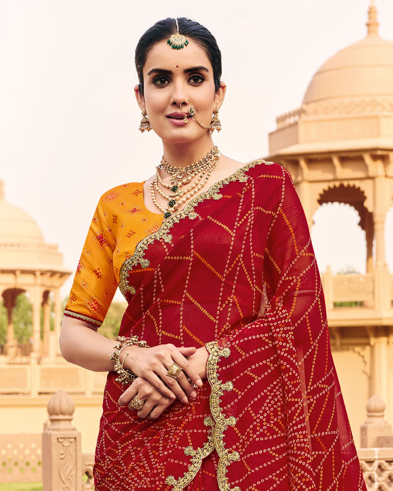 Vishal Prints Sindoori Red Traditional Print Georgette Saree With Fancy Cut Work Embroidery Border