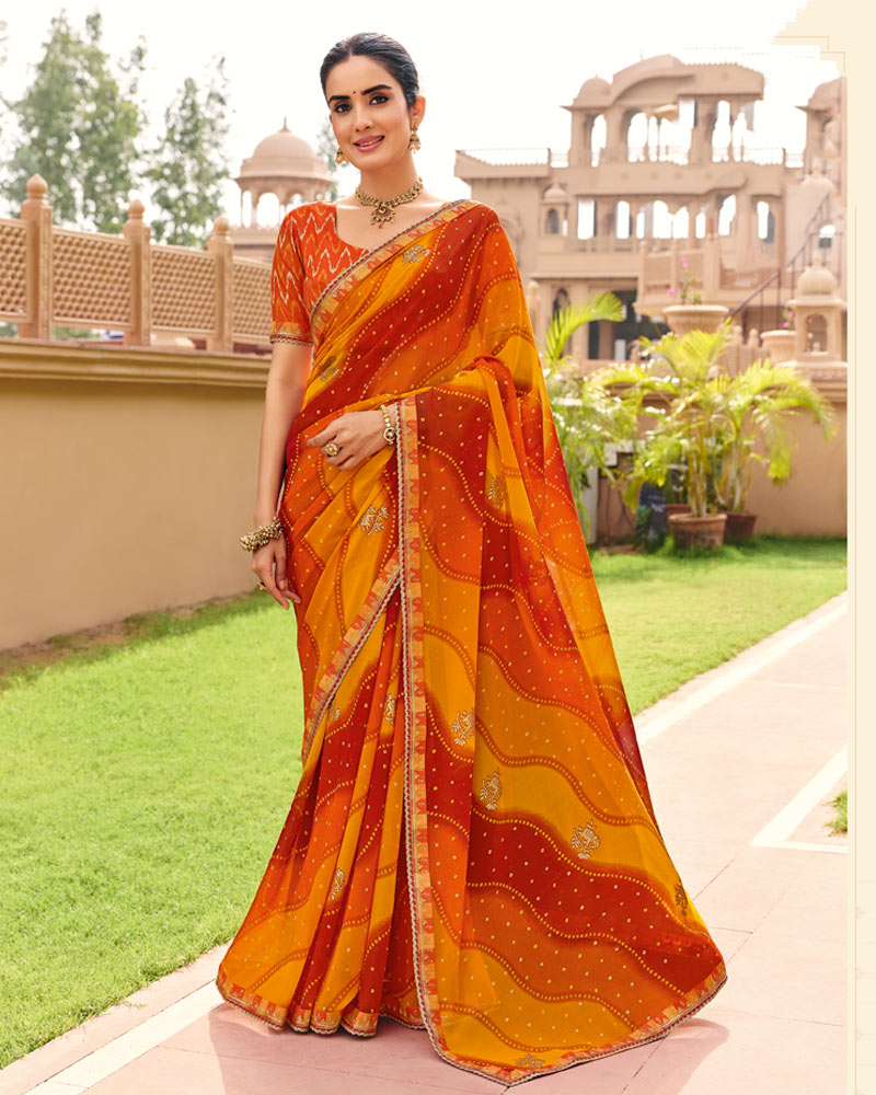 Vishal Prints Saffron Orange Yellow Traditional Print Georgette Saree With Fancy Gota Patti Border