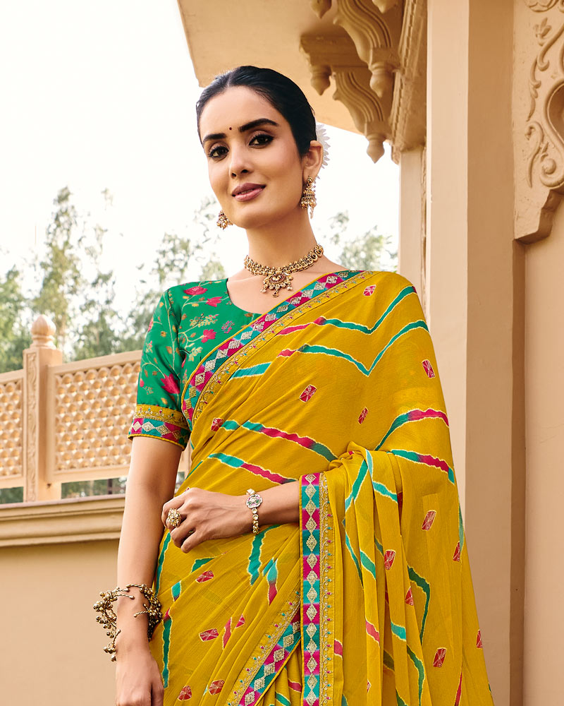 Vishal Prints Pitambar Yellow Traditional Print Chiffon Saree With Fancy Gota Patti Border