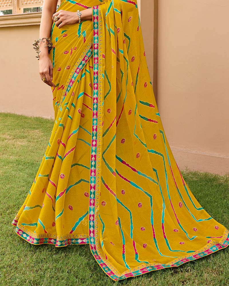 Vishal Prints Pitambar Yellow Traditional Print Chiffon Saree With Fancy Gota Patti Border