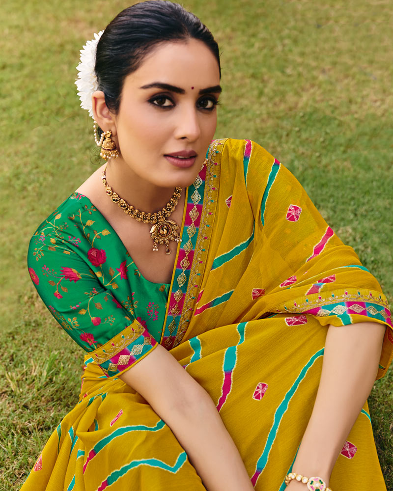 Vishal Prints Pitambar Yellow Traditional Print Chiffon Saree With Fancy Gota Patti Border