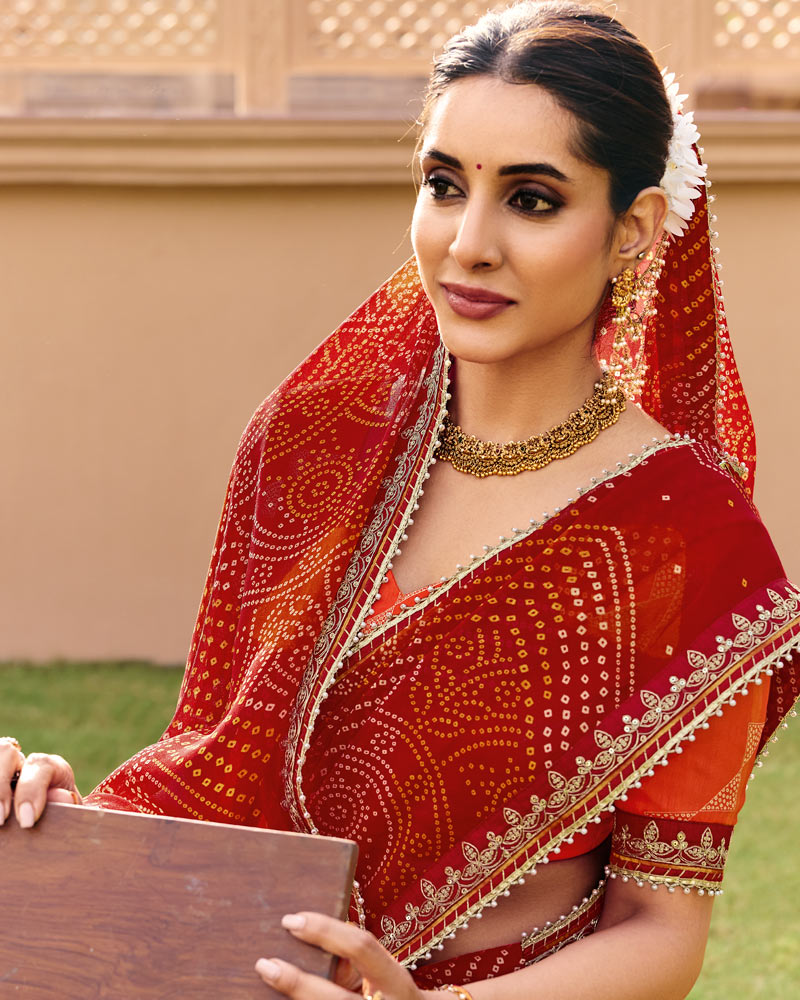 Vishal Prints Kumkum Red Traditional Print Georgette Saree With Fancy Gota Patti Border