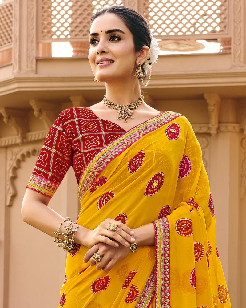 Vishal Prints Haldi Peela Traditional Print Georgette Saree With Fancy Gota Patti Border