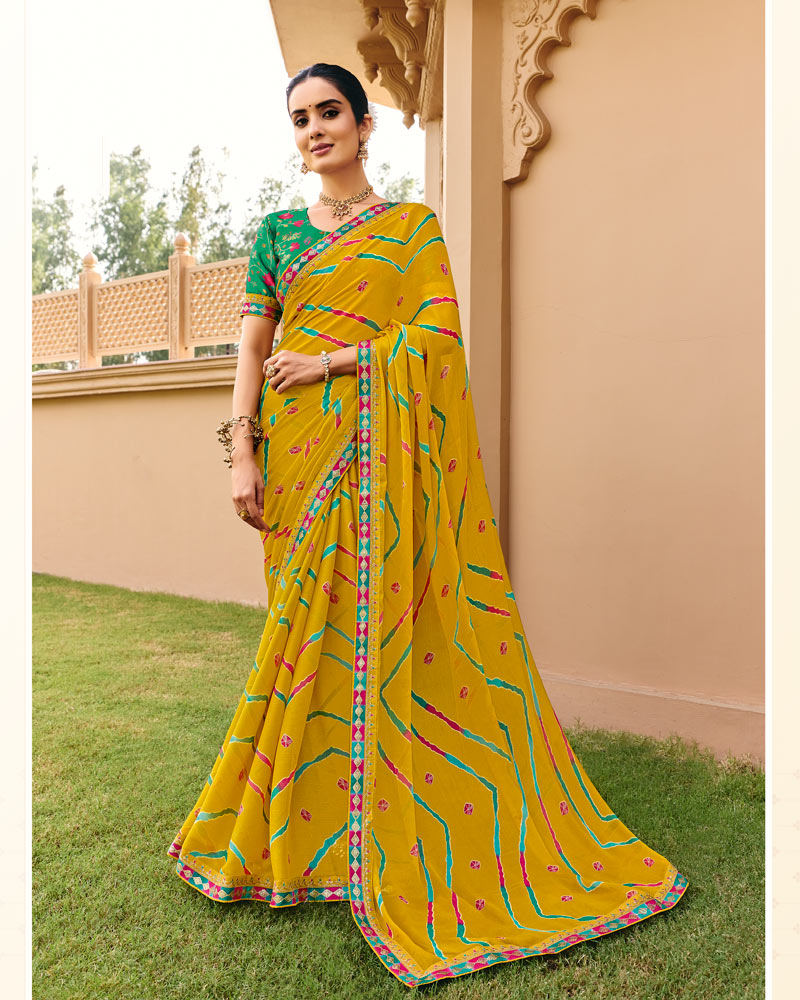 Vishal Prints Pitambar Yellow Traditional Print Chiffon Saree With Fancy Gota Patti Border