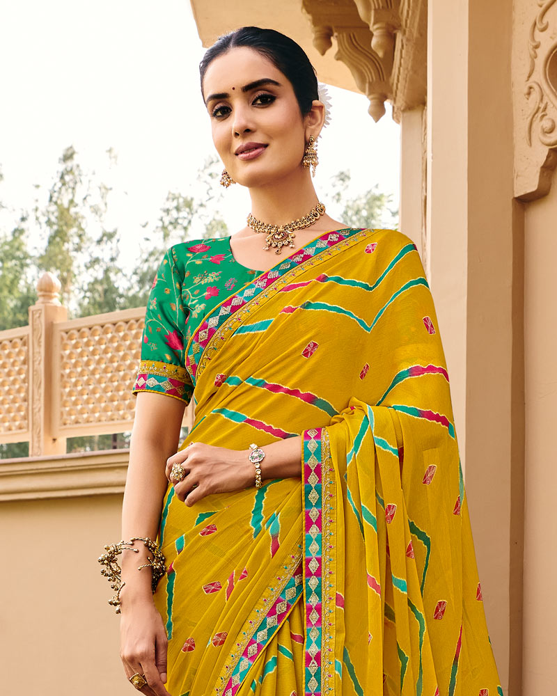 Vishal Prints Pitambar Yellow Traditional Print Chiffon Saree With Fancy Gota Patti Border