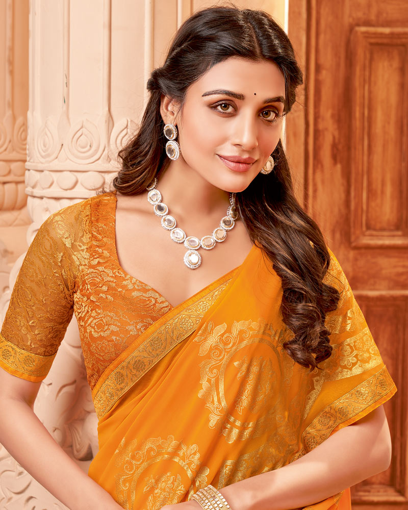Vishal Prints Yellowish Orange Georgette Saree With Foil Print And Zari Border