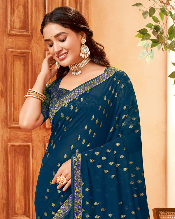 Vishal Prints Peacock Blue Georgette Saree With Foil Print And Zari Border