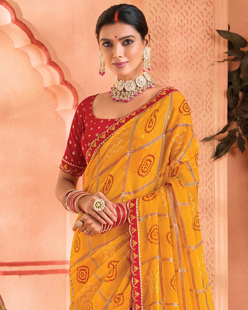 Vishal Prints Yellowish Orange Bandhani Print Chiffon Saree With Foil Print And Fancy Border